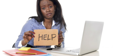 woman in work stress at asking for help