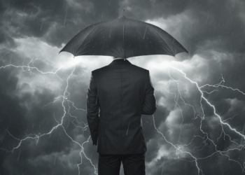 Trouble ahead concept, Businessman with umbrella standing in the